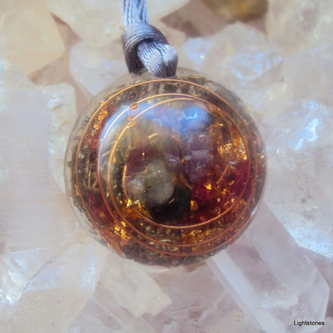 Lightdrop Orgone Pendant, herkimmer diamond, emerald, ametyst.
