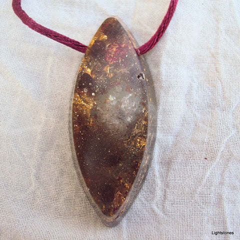 Golden harmonizer, vesica pisces with herkimmer diamond, garnet