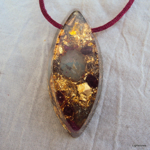 Golden harmonizer, vesica pisces with herkimmer and garnet