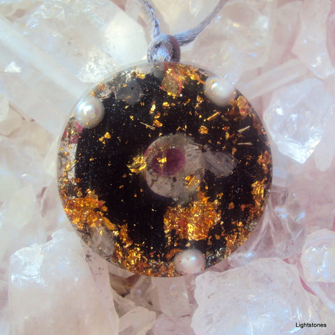 Orgone pendant, ruby and shungite.