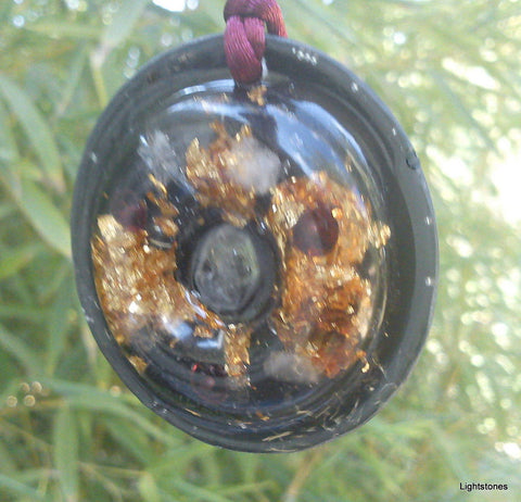 Shungite torus disc orgone pendant, garnet and rose quartz