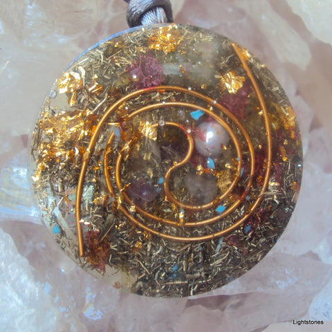 Golden Spiral Orgone Pendant, pearl and ametyst